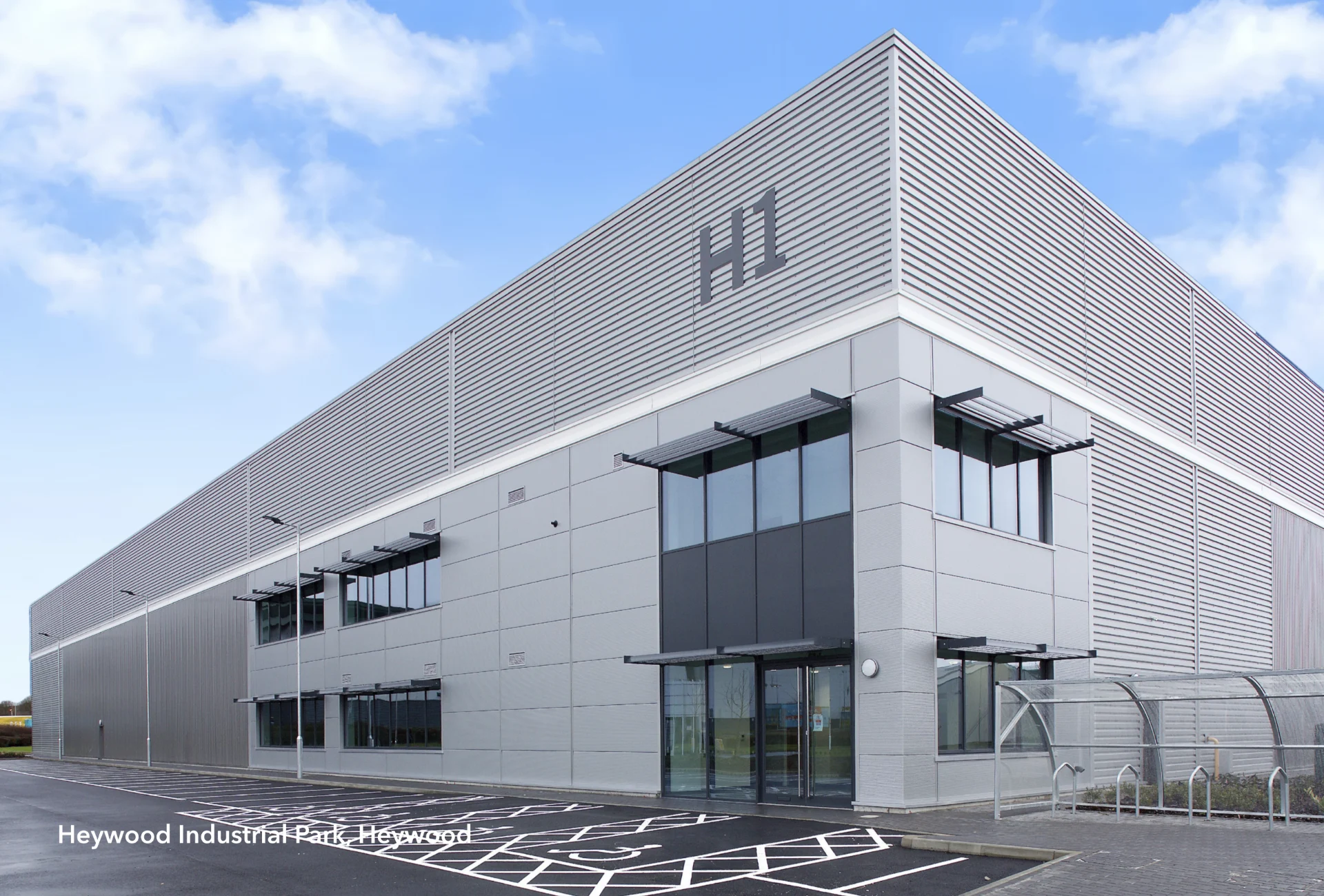 Modern industrial warehouse building marked H1 at Heywood Industrial Park
